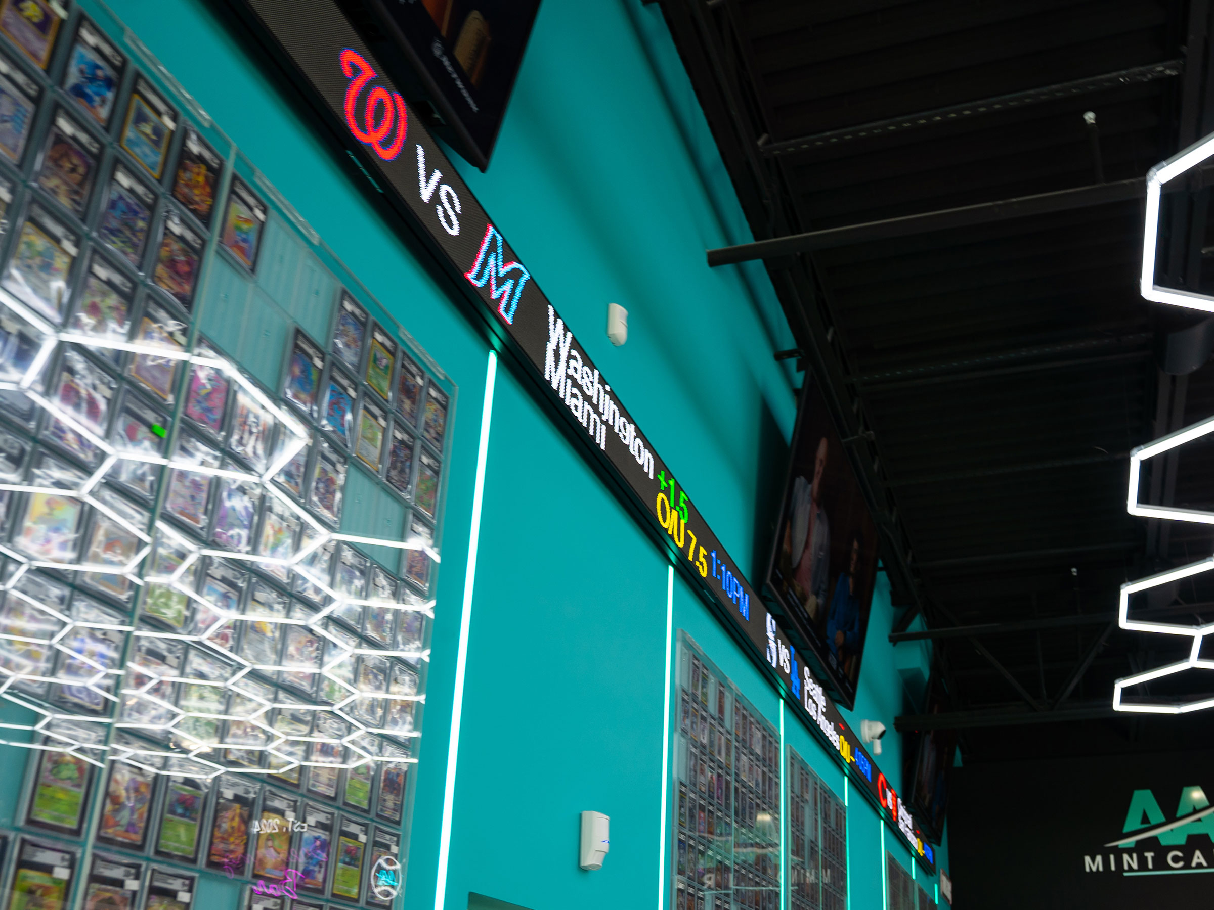 Live Sports Ticker - The 36-foot live sports ticker continuously displays scores from NFL, NBA, MLB, and NHL games.
